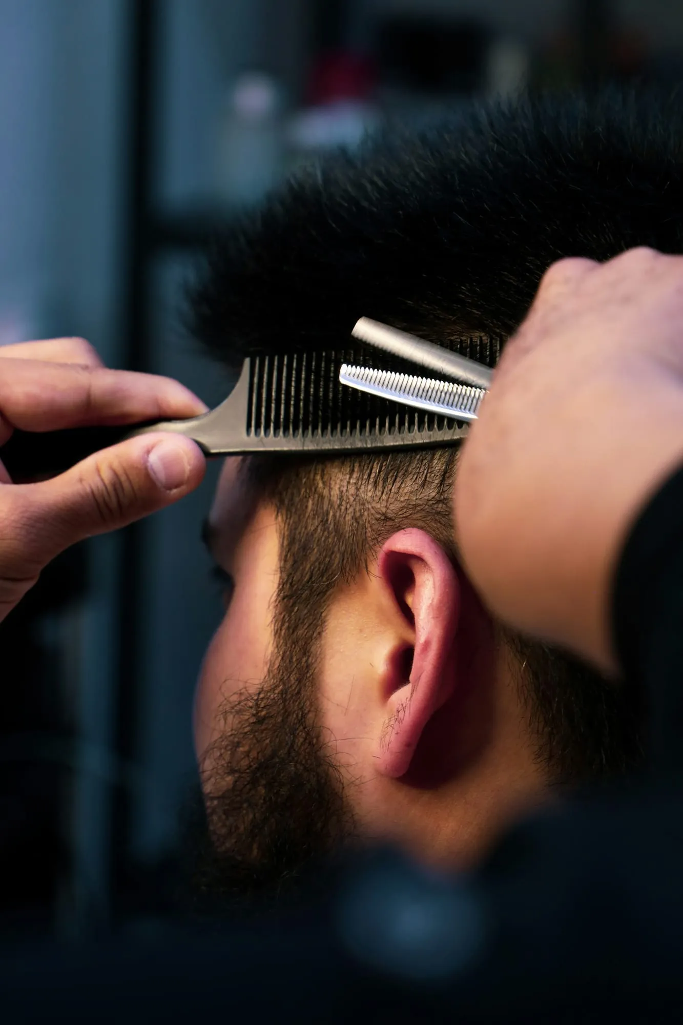 Close-up of thinning shears and comb
